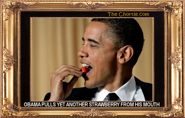 Obama pulls yet another strawberry from his mouth.