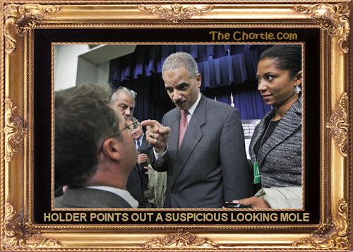 Holder points out a suspicious looking mole