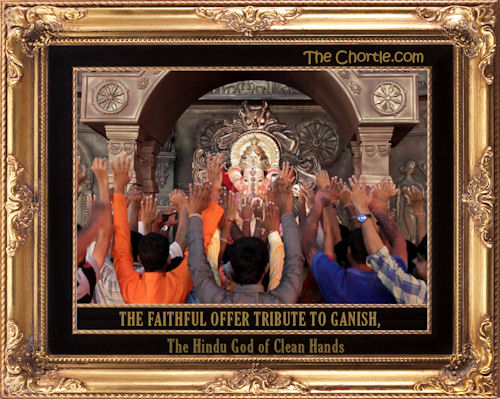 The faithful offer tribute to Ganish, the Hindu god of clean hands