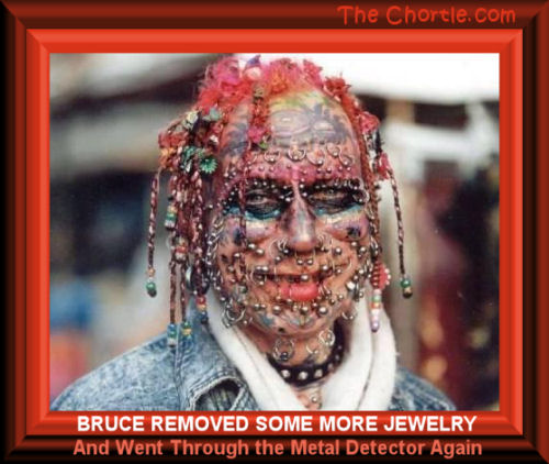 Bruce removed some more jewelry and went through the metal detector again.