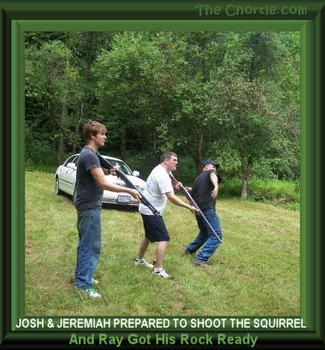 Josh and Jeremiah prepared to shoot the squirrel and Ray got his rock ready.