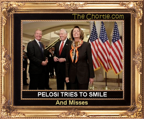 Pelosi tries to smile and misses.