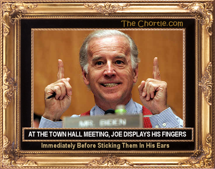 At the town hall meeting, Joe displays his fingers immediately before sticking them in his ears.