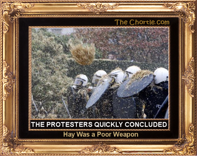 The protesters quickly conclude hay is a poor offensive weapon.