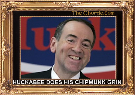 Huckabee does his chipmunk grin