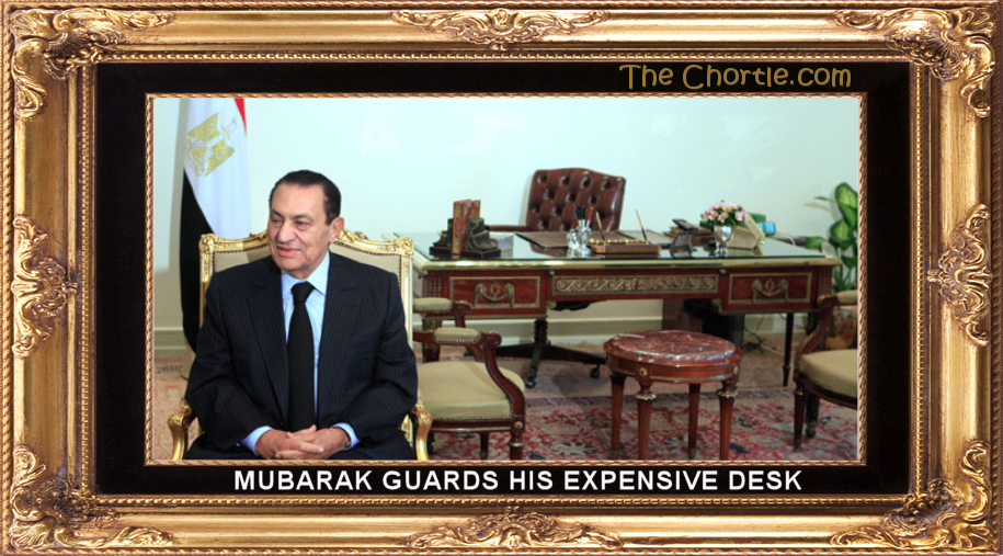 Mubarak guards his expensive desk.
