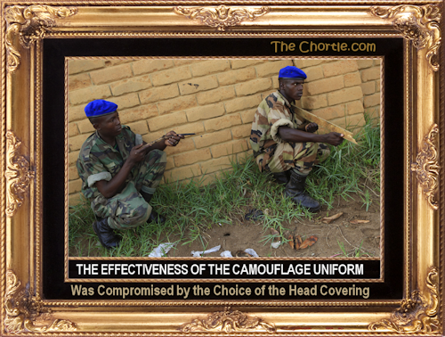 The effectiveness of the camouflage uniform wascompromised be the chioce of the head covering.